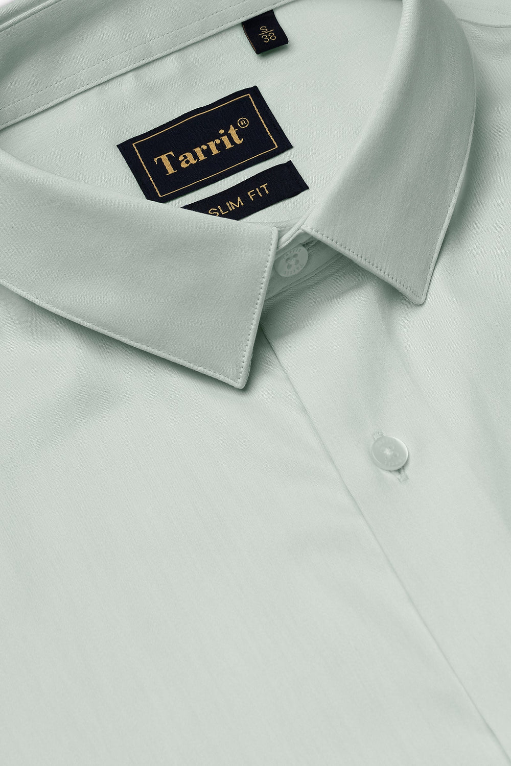 A neat, crease-resistant Tarrit comfort fit Giza cotton shirt showing a smooth drape