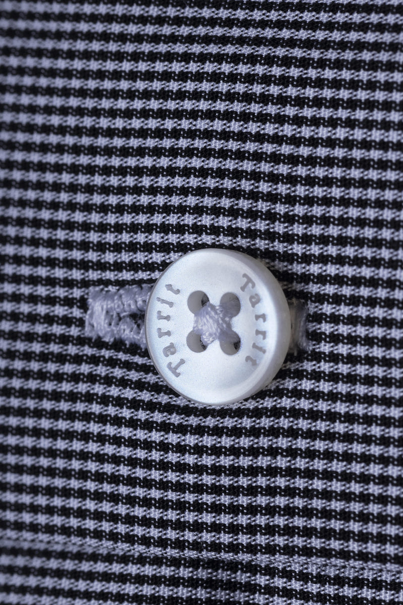 Close-up of quality shirt construction from Tarrit — stitching, seam and collar detail