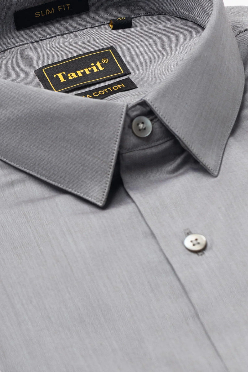 How can men move away from loud fashion trends and develop a timeless clothing style?